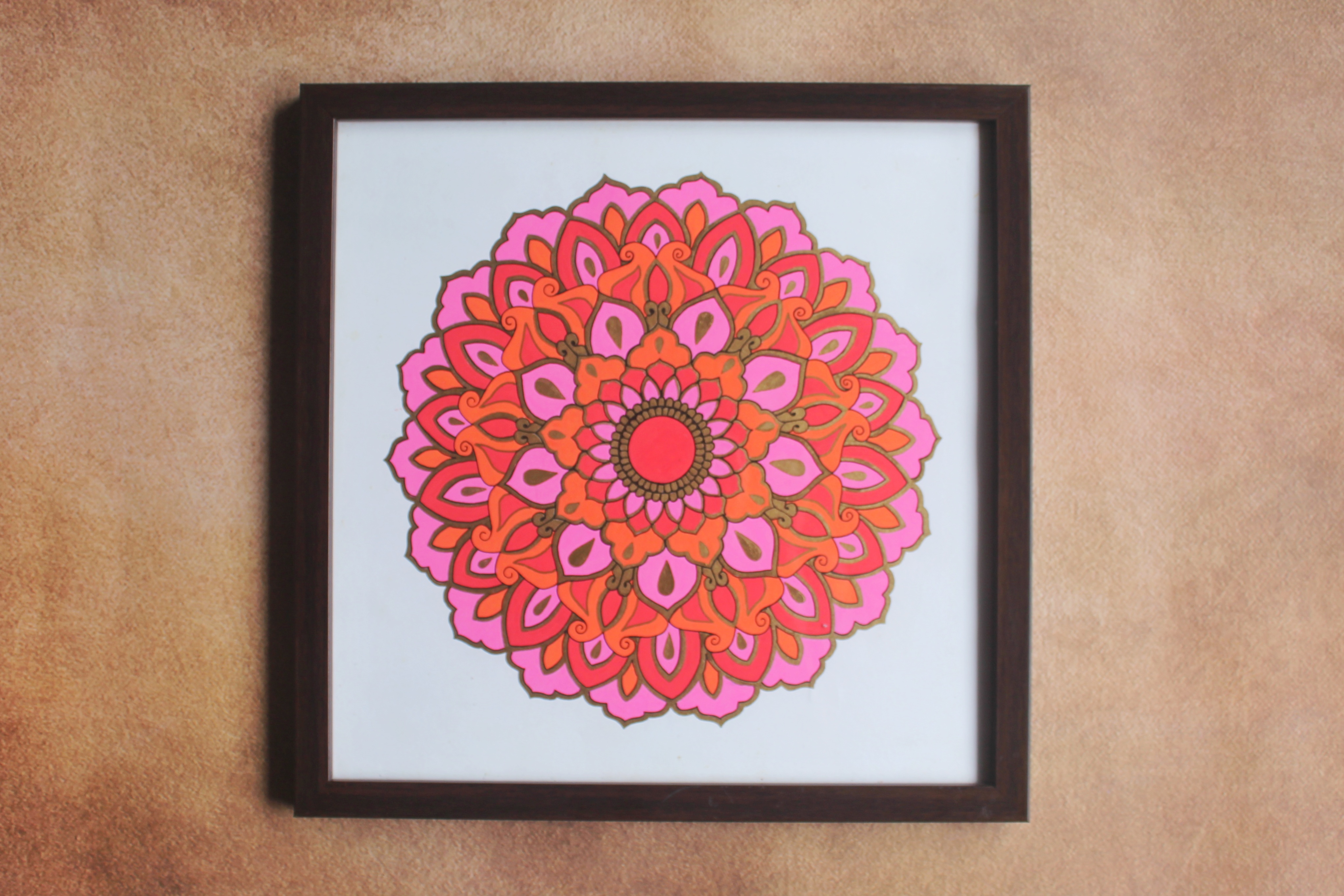 Pink and orange hand-drawn framed floral mandala wall decor