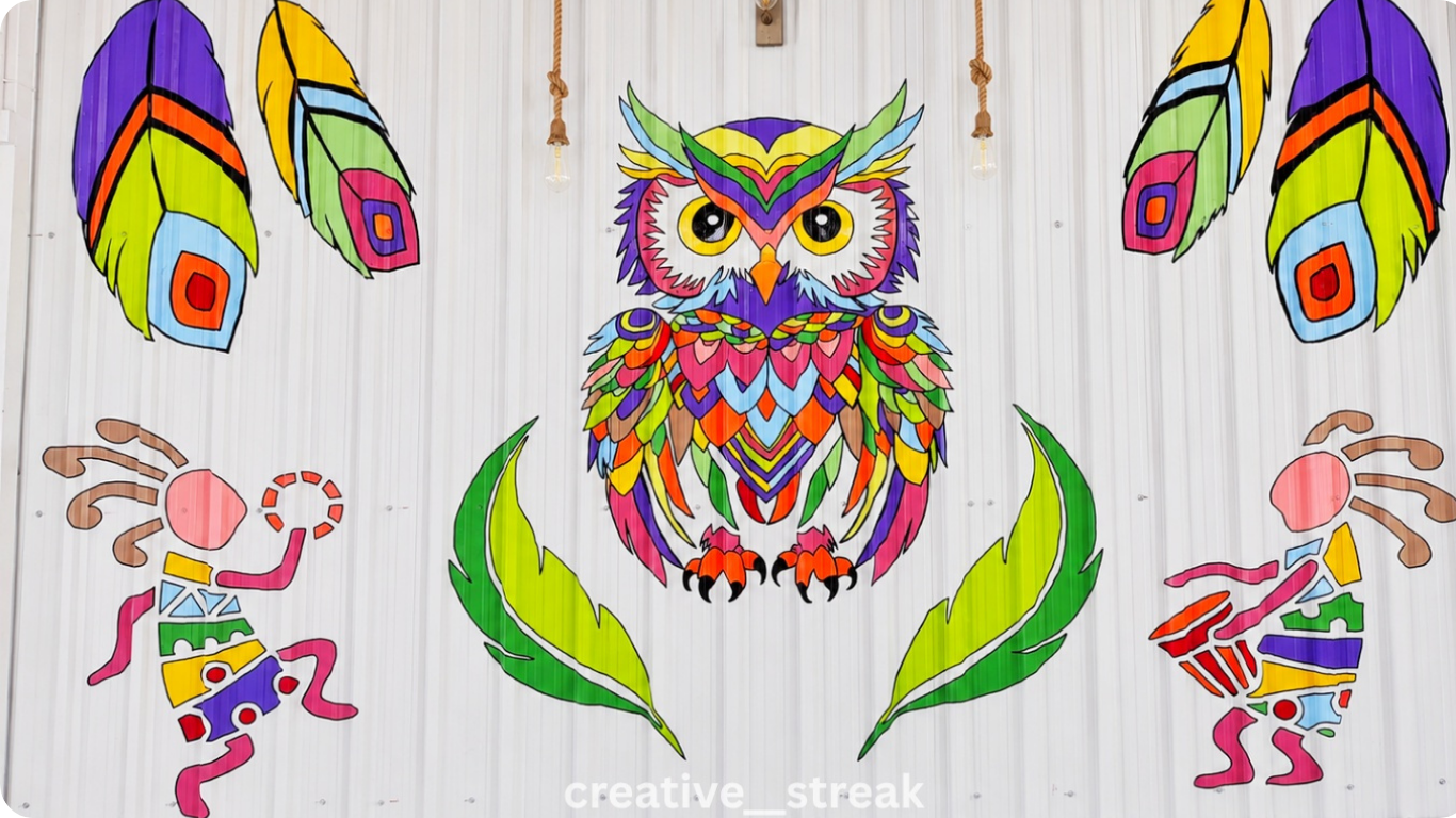 Custom hand-painted colourful owl wall mural